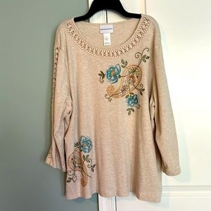 Cotton top with embellishments.